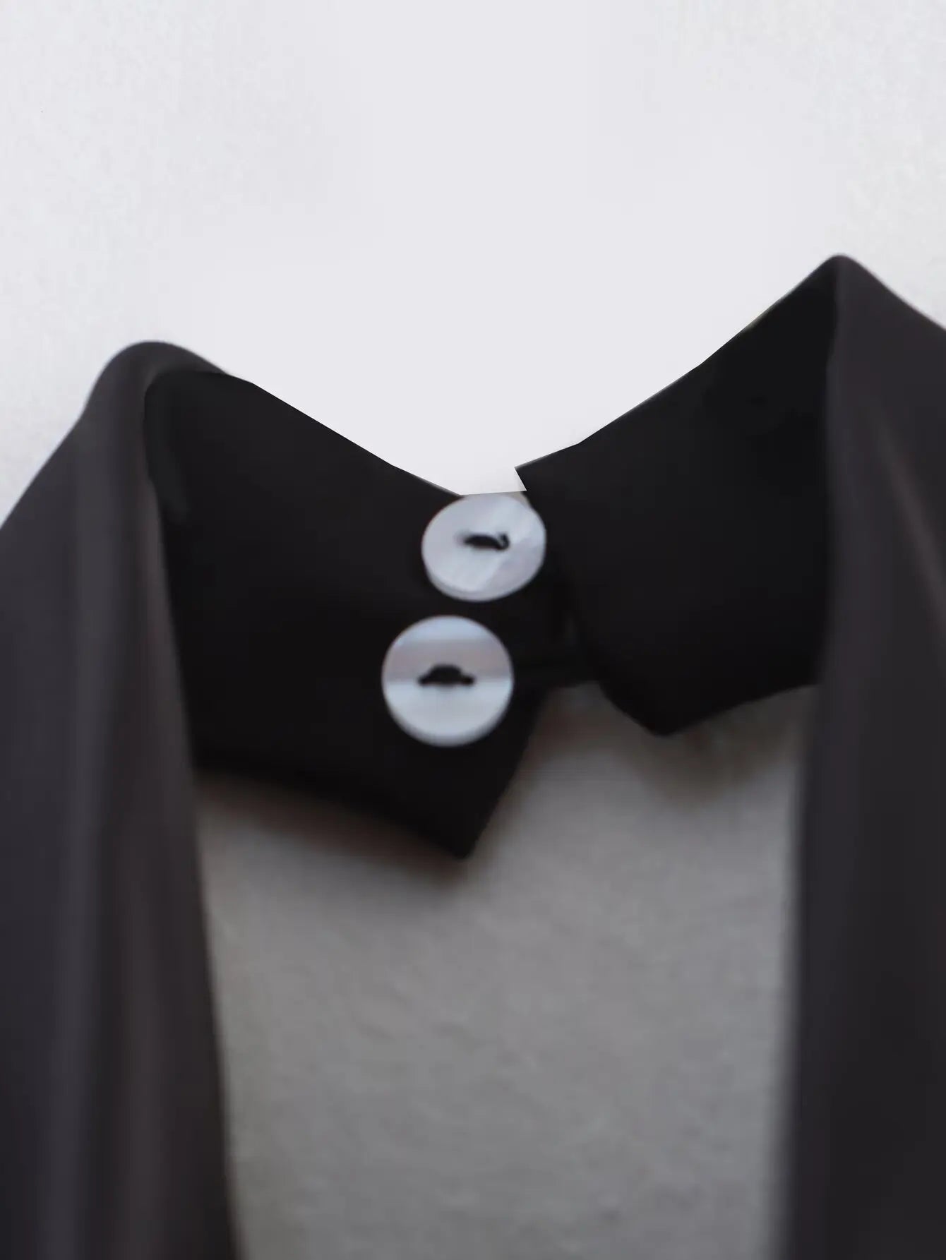 Haut élégant à col roulé sans manches pour femme