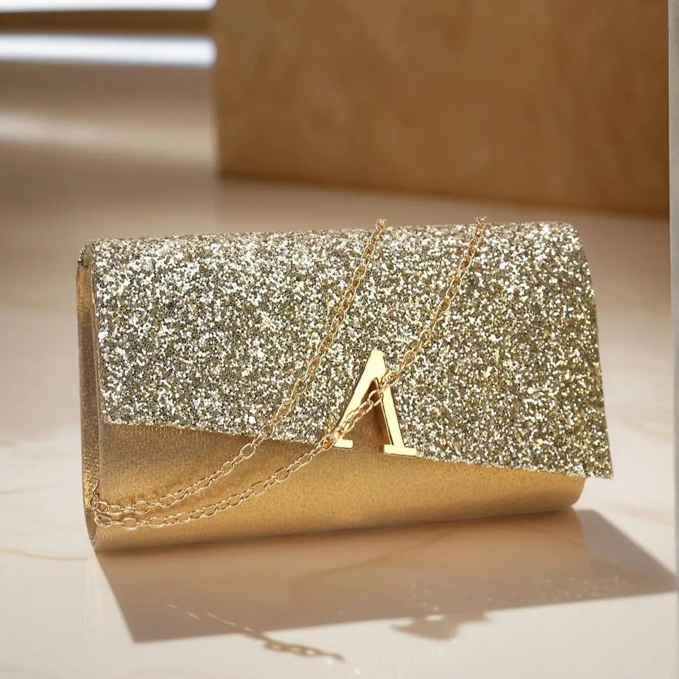 Borsa Clutch Rigida Glitter con Chiusura Geometrica