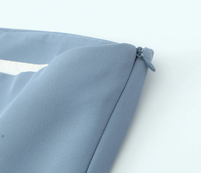 Top a Fascia Drappeggiato e Pantalone Sartoriale
