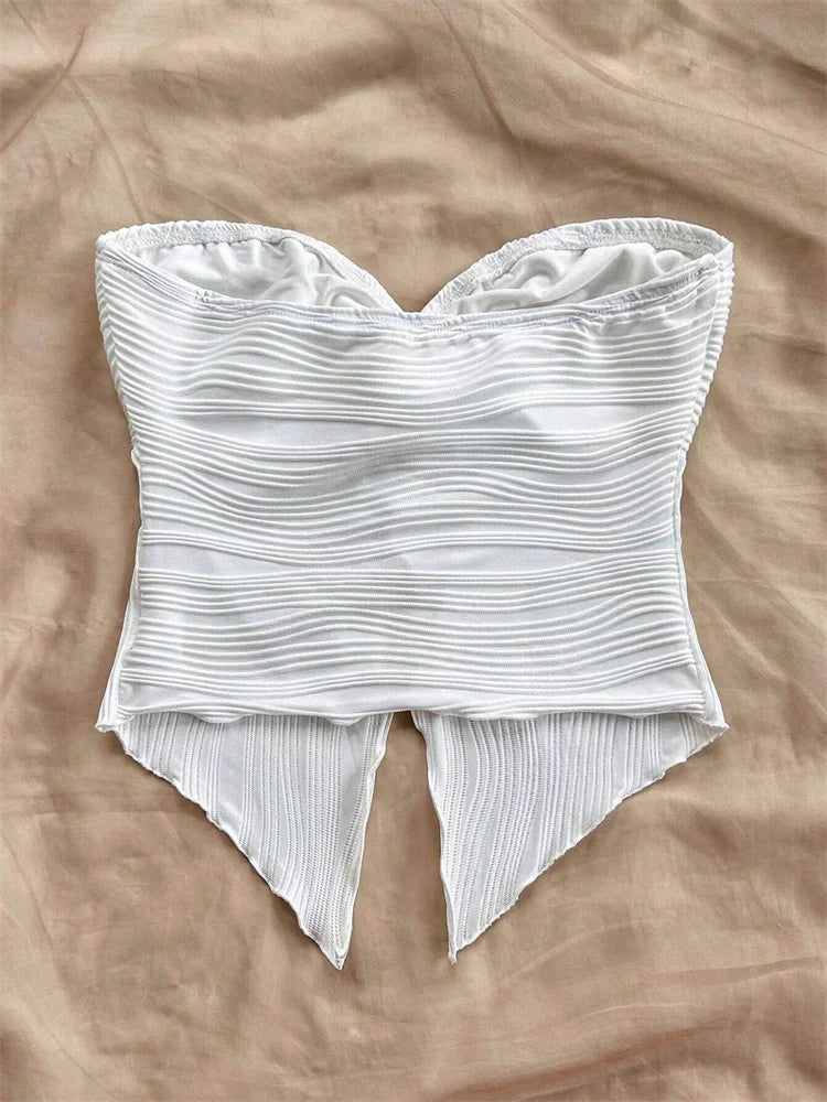 Haut blanc drapé d'été