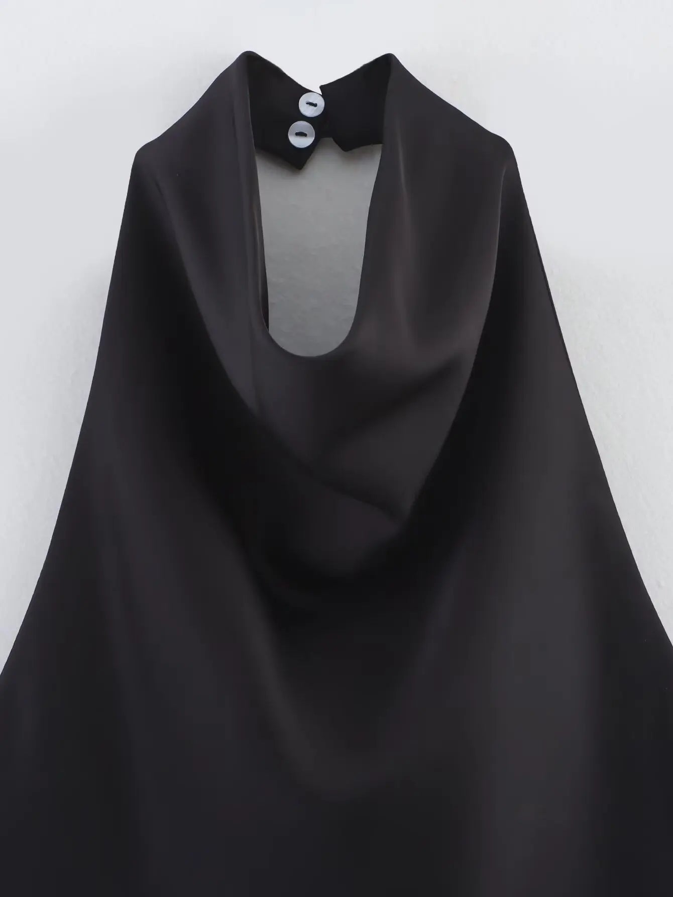 Haut élégant à col roulé sans manches pour femme
