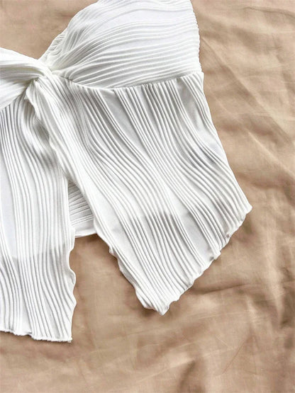 Haut blanc drapé d'été