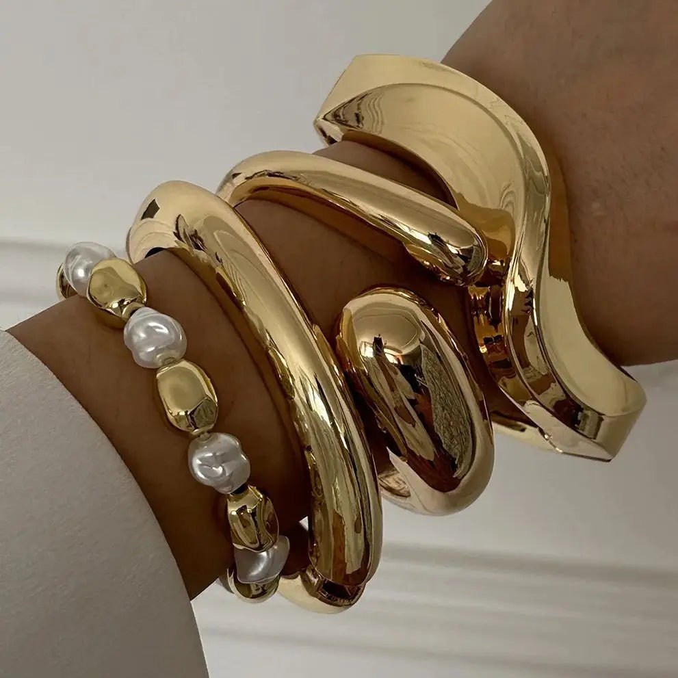 Bracciale Rigido Scultoreo in Oro Lucido - Rosboutiquechic