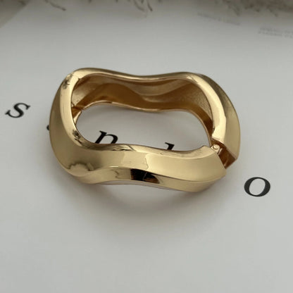 Bracciale Rigido Scultoreo in Oro Lucido - Rosboutiquechic