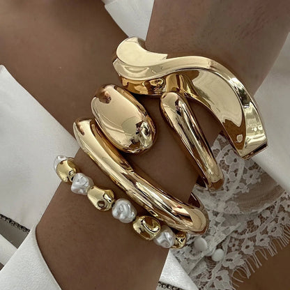 Bracciale Rigido Scultoreo in Oro Lucido - Rosboutiquechic